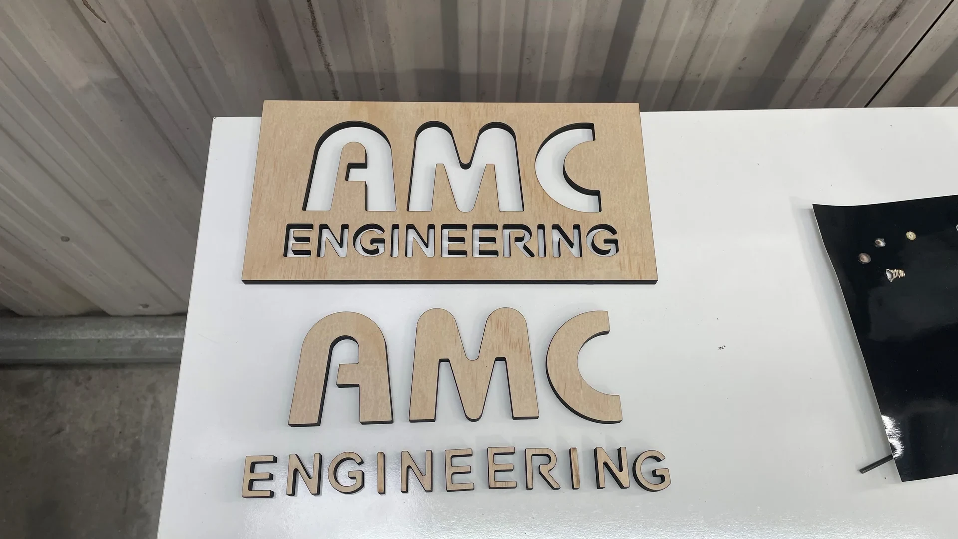 AMC Engineering lettering and signs laser cut from plywood