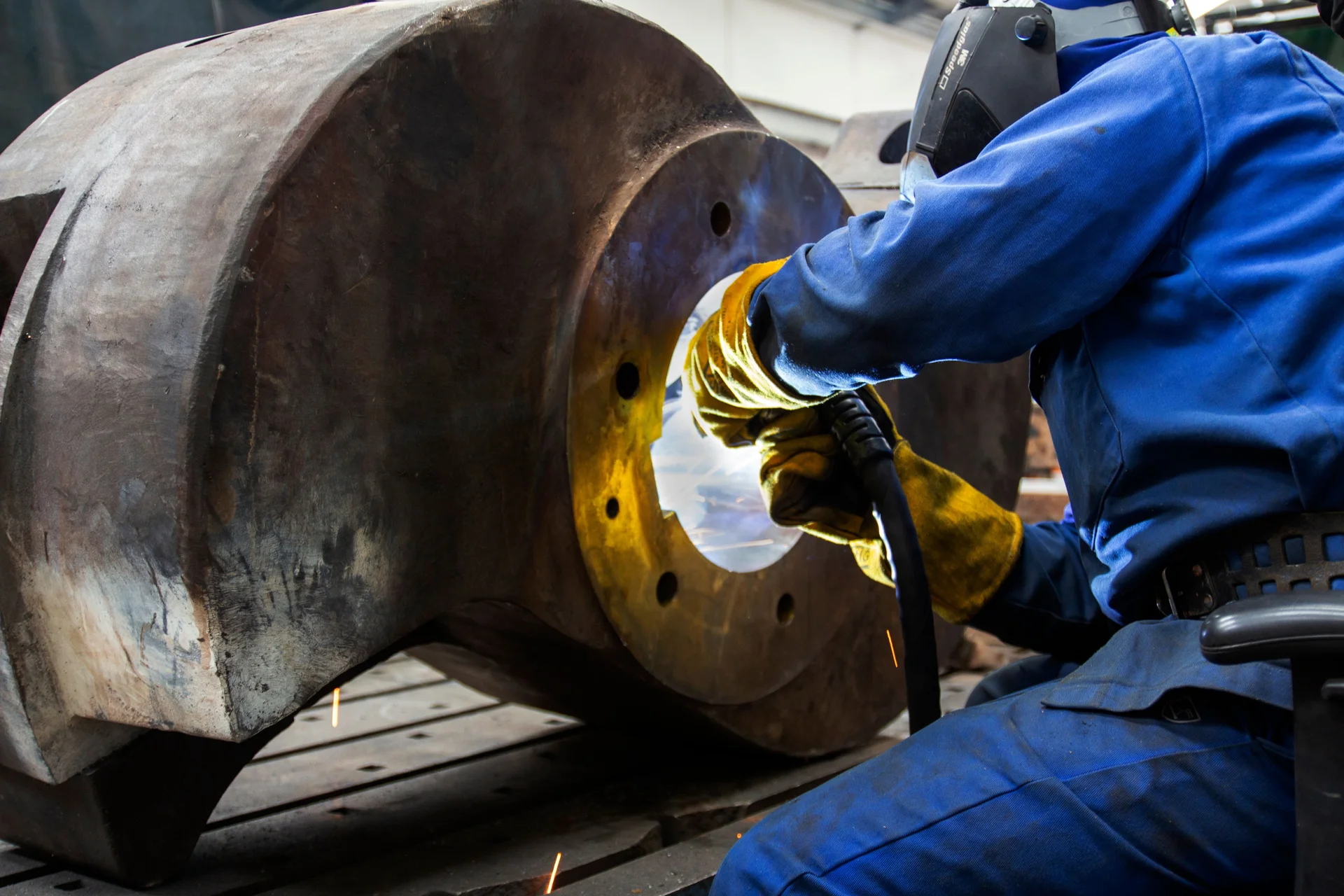 Welding repair on a heavy steel machine part
